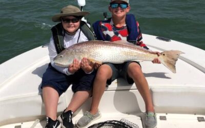 Catch of a Lifetime: Young Anglers Reel in Giant Redfish